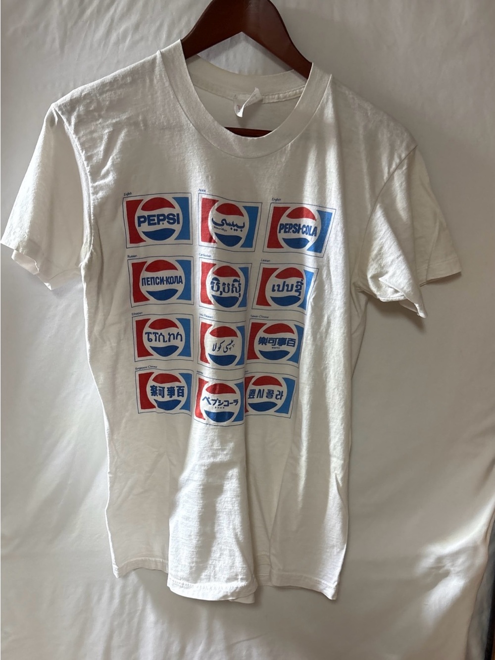 Pepsi Multinational Logo Grid Tee - White with Red & Blue Size L. 1990's